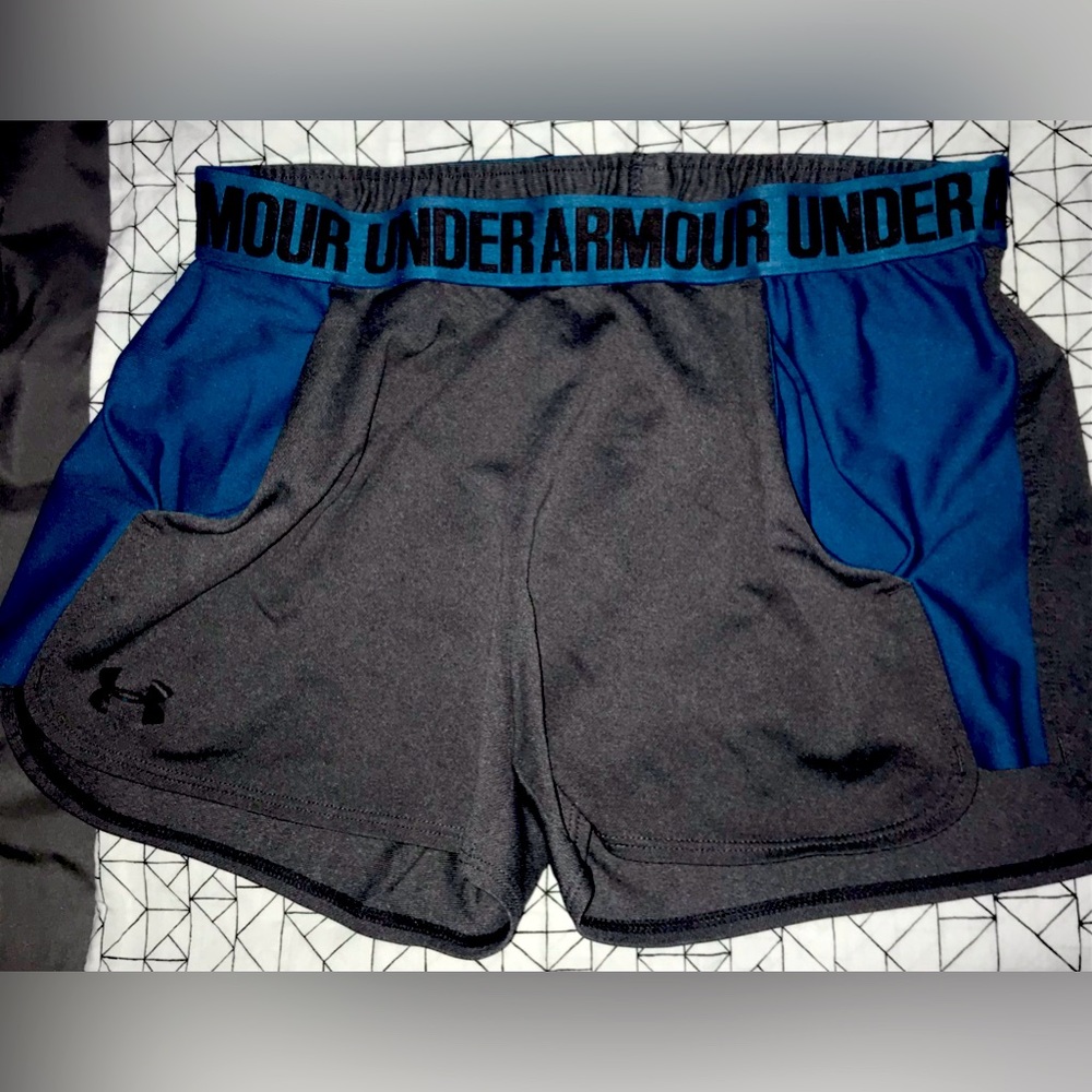 Upgrade your sporty wardrobe with these women's Under Armour active shorts.